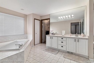 Move-in ready with immediate occupancy! This beautiful colonial on Pheasant Run Golf Club in Michigan - for sale on GolfHomes.com, golf home, golf lot