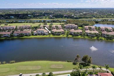 This highly upgraded carriage home in Jupiter Country Club on Jupiter Country Club in Florida - for sale on GolfHomes.com, golf home, golf lot