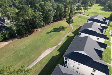 This immaculate 2nd-floor condo in the highly sought-after River on River Oaks Golf Plantation  in South Carolina - for sale on GolfHomes.com, golf home, golf lot