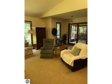 This home in the attractive Michabou Shores Subdivision is about on Crystal Downs Country Club in Michigan - for sale on GolfHomes.com, golf home, golf lot