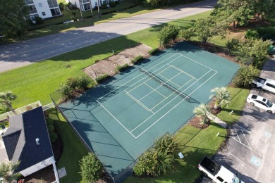 This immaculate 2nd-floor condo in the highly sought-after River on River Oaks Golf Plantation  in South Carolina - for sale on GolfHomes.com, golf home, golf lot