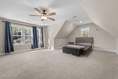 Discover this lovely 4 bedroom, 3.5 bathroom home located inside on Seven Lakes Country Club in North Carolina - for sale on GolfHomes.com, golf home, golf lot