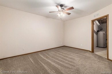 Move-in ready with immediate occupancy! This beautiful colonial on Pheasant Run Golf Club in Michigan - for sale on GolfHomes.com, golf home, golf lot