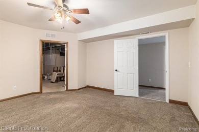 Move-in ready with immediate occupancy! This beautiful colonial on Pheasant Run Golf Club in Michigan - for sale on GolfHomes.com, golf home, golf lot