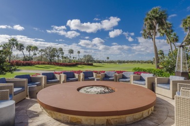 This highly upgraded carriage home in Jupiter Country Club on Jupiter Country Club in Florida - for sale on GolfHomes.com, golf home, golf lot