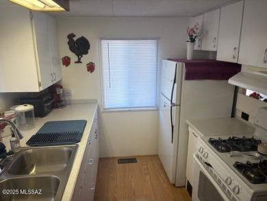 Very nice well cared for fully furnished home with Ramada roof on Tucson Estates Golf Course in Arizona - for sale on GolfHomes.com, golf home, golf lot