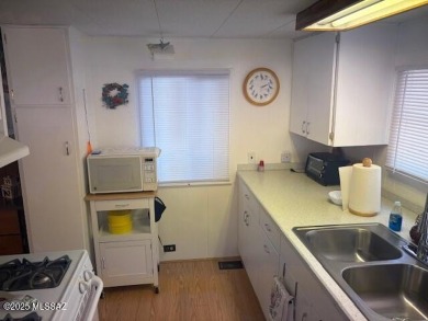 Very nice well cared for fully furnished home with Ramada roof on Tucson Estates Golf Course in Arizona - for sale on GolfHomes.com, golf home, golf lot