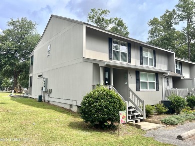 Updated End Unit Townhome with additional heated/cooled sq on Diamondhead Country Club in Mississippi - for sale on GolfHomes.com, golf home, golf lot