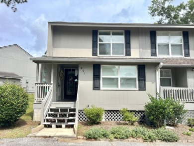 Updated End Unit Townhome with additional heated/cooled sq on Diamondhead Country Club in Mississippi - for sale on GolfHomes.com, golf home, golf lot