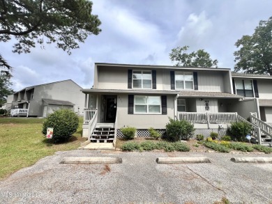 Updated End Unit Townhome with additional heated/cooled sq on Diamondhead Country Club in Mississippi - for sale on GolfHomes.com, golf home, golf lot