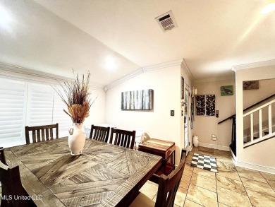 Updated End Unit Townhome with additional heated/cooled sq on Diamondhead Country Club in Mississippi - for sale on GolfHomes.com, golf home, golf lot