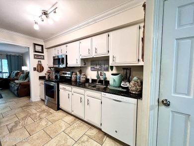 Updated End Unit Townhome with additional heated/cooled sq on Diamondhead Country Club in Mississippi - for sale on GolfHomes.com, golf home, golf lot