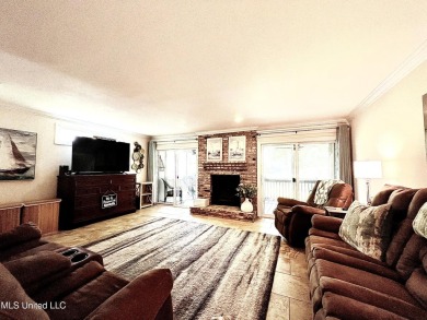 Updated End Unit Townhome with additional heated/cooled sq on Diamondhead Country Club in Mississippi - for sale on GolfHomes.com, golf home, golf lot