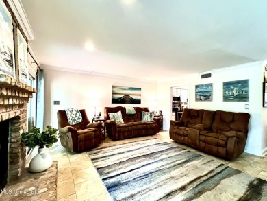 Updated End Unit Townhome with additional heated/cooled sq on Diamondhead Country Club in Mississippi - for sale on GolfHomes.com, golf home, golf lot