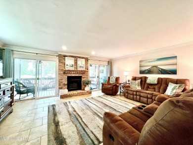 Updated End Unit Townhome with additional heated/cooled sq on Diamondhead Country Club in Mississippi - for sale on GolfHomes.com, golf home, golf lot