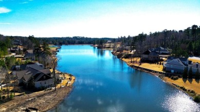 This gently sloping .48 acre waterfront lot offers an expansive on The Reserve Club At Woodside Plantation in South Carolina - for sale on GolfHomes.com, golf home, golf lot