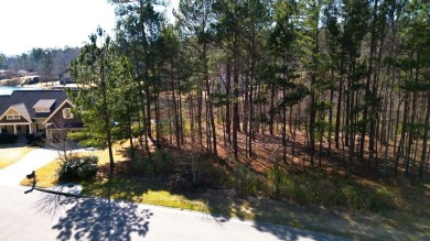 This gently sloping .48 acre waterfront lot offers an expansive on The Reserve Club At Woodside Plantation in South Carolina - for sale on GolfHomes.com, golf home, golf lot