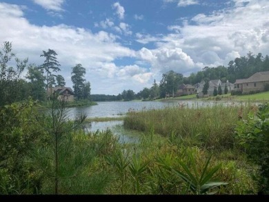 This gently sloping .48 acre waterfront lot offers an expansive on The Reserve Club At Woodside Plantation in South Carolina - for sale on GolfHomes.com, golf home, golf lot