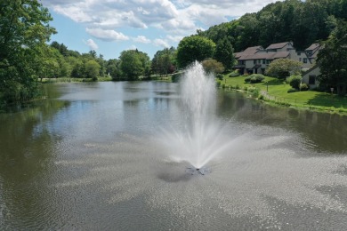 Introducing a charming 3 bedroom unit nestled in the heart of on Heritage Village Country Club in Connecticut - for sale on GolfHomes.com, golf home, golf lot