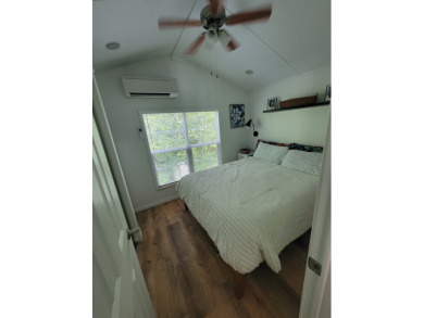 This two bedroom, 1.5 half bath Park Model is located in highly on Point Sebago Golf/Beach Resort in Maine - for sale on GolfHomes.com, golf home, golf lot