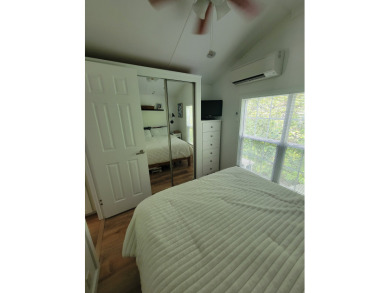 This two bedroom, 1.5 half bath Park Model is located in highly on Point Sebago Golf/Beach Resort in Maine - for sale on GolfHomes.com, golf home, golf lot