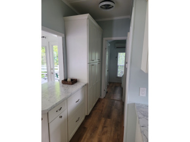 This two bedroom, 1.5 half bath Park Model is located in highly on Point Sebago Golf/Beach Resort in Maine - for sale on GolfHomes.com, golf home, golf lot