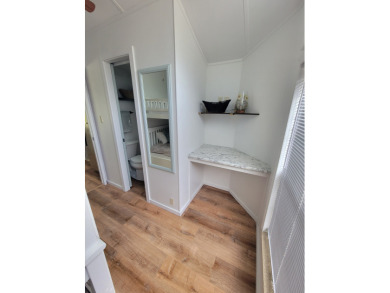 This two bedroom, 1.5 half bath Park Model is located in highly on Point Sebago Golf/Beach Resort in Maine - for sale on GolfHomes.com, golf home, golf lot