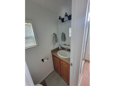 This two bedroom, 1.5 half bath Park Model is located in highly on Point Sebago Golf/Beach Resort in Maine - for sale on GolfHomes.com, golf home, golf lot
