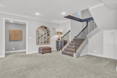 Exquisite Don Julian Reverse 1.5-Story with Golf Course Views in on Staley Farms Golf Club in Missouri - for sale on GolfHomes.com, golf home, golf lot