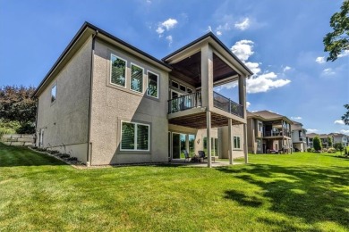 Exquisite Don Julian Reverse 1.5-Story with Golf Course Views in on Staley Farms Golf Club in Missouri - for sale on GolfHomes.com, golf home, golf lot