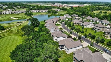 Exquisite Don Julian Reverse 1.5-Story with Golf Course Views in on Staley Farms Golf Club in Missouri - for sale on GolfHomes.com, golf home, golf lot