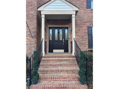 Beautiful brick-front traditional home located on the 7th hole on Williamsburg National Golf Club in Virginia - for sale on GolfHomes.com, golf home, golf lot