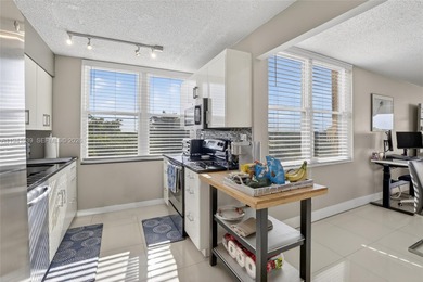 **SPACIOUS AND BRIGHT 3/2 - BEAUTIFULLY RENOVATED WITH A MODERN on Inverrary Country Club in Florida - for sale on GolfHomes.com, golf home, golf lot