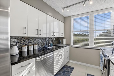 **SPACIOUS AND BRIGHT 3/2 - BEAUTIFULLY RENOVATED WITH A MODERN on Inverrary Country Club in Florida - for sale on GolfHomes.com, golf home, golf lot