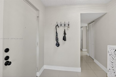 **SPACIOUS AND BRIGHT 3/2 - BEAUTIFULLY RENOVATED WITH A MODERN on Inverrary Country Club in Florida - for sale on GolfHomes.com, golf home, golf lot