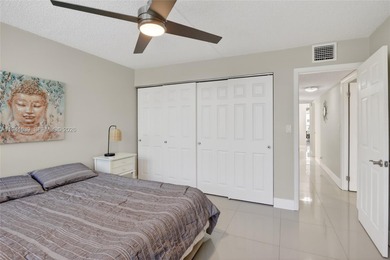 **SPACIOUS AND BRIGHT 3/2 - BEAUTIFULLY RENOVATED WITH A MODERN on Inverrary Country Club in Florida - for sale on GolfHomes.com, golf home, golf lot