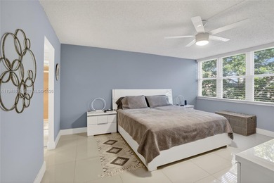 **SPACIOUS AND BRIGHT 3/2 - BEAUTIFULLY RENOVATED WITH A MODERN on Inverrary Country Club in Florida - for sale on GolfHomes.com, golf home, golf lot