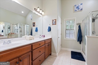Resort-style living starts here! This master-on-main beauty sits on Summergrove Golf Club in Georgia - for sale on GolfHomes.com, golf home, golf lot