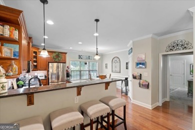 Resort-style living starts here! This master-on-main beauty sits on Summergrove Golf Club in Georgia - for sale on GolfHomes.com, golf home, golf lot