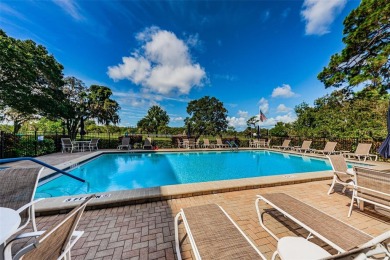 Great opportunity to enjoy living a carefree lifestyle in this on Tarpon Springs Golf Course in Florida - for sale on GolfHomes.com, golf home, golf lot