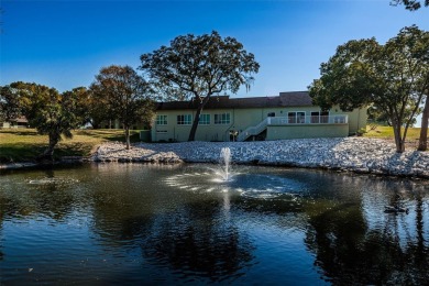 Great opportunity to enjoy living a carefree lifestyle in this on Tarpon Springs Golf Course in Florida - for sale on GolfHomes.com, golf home, golf lot