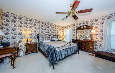 Welcome Timber Greens, a premier 55+ gated golf community. This on Timber Greens Country Club in Florida - for sale on GolfHomes.com, golf home, golf lot