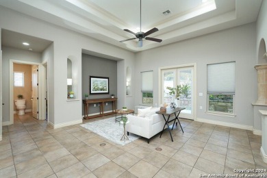 This charming two bedroom/two bath Mediterranean-style garden on The Dominion Country Club in Texas - for sale on GolfHomes.com, golf home, golf lot