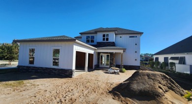 Welcome to this stunning new construction home in the on Wild Wing Plantation in South Carolina - for sale on GolfHomes.com, golf home, golf lot