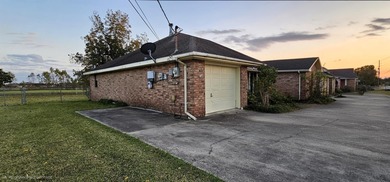 This charming 3-bedroom, 2-bath home offers the perfect blend of on Bayou Country Club in Louisiana - for sale on GolfHomes.com, golf home, golf lot