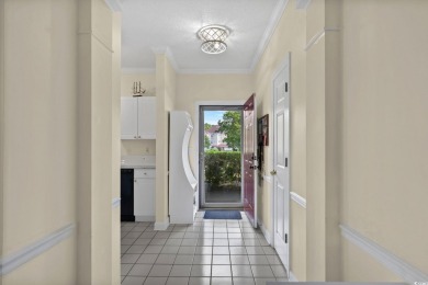 Welcome to this charming 2 bedroom, 2 bathroom 1st floor condo on Barefoot Resort and Golf Club  in South Carolina - for sale on GolfHomes.com, golf home, golf lot