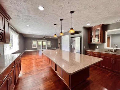 Beautifully updated 4 bedroom, 2 bathroom home in Village Green on Twin Lakes Golf Club in Arkansas - for sale on GolfHomes.com, golf home, golf lot