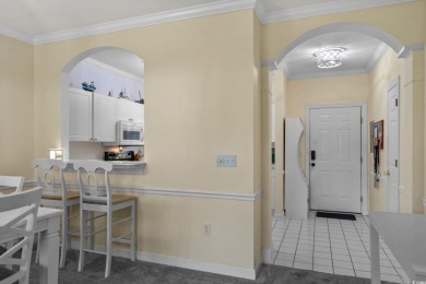 Welcome to this charming 2 bedroom, 2 bathroom 1st floor condo on Barefoot Resort and Golf Club  in South Carolina - for sale on GolfHomes.com, golf home, golf lot