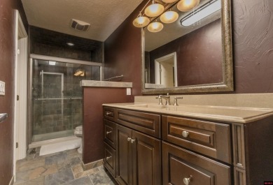 Beautifully updated 4 bedroom, 2 bathroom home in Village Green on Twin Lakes Golf Club in Arkansas - for sale on GolfHomes.com, golf home, golf lot