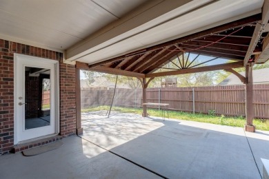 Discover the perfect blend of comfort, convenience, and on Mansfield National Golf Club in Texas - for sale on GolfHomes.com, golf home, golf lot